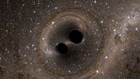 Schwarze Löcher umkreisen sich und senden Gravitationswellen aus